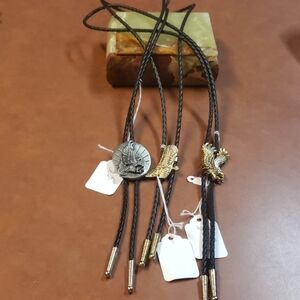 A set of three Bolo ties will seperate if interest